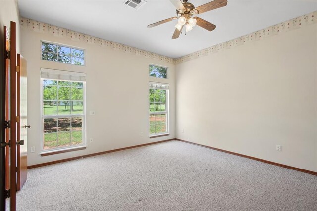 1227 Stout Dr NW, Piedmont, OK 73078 - empty room with carpet, baseboards, and ceiling fan