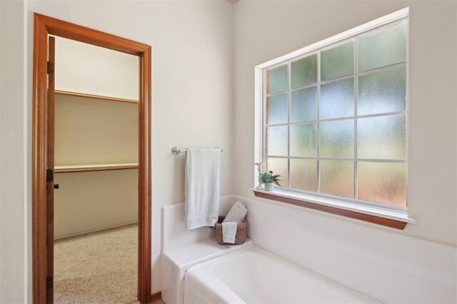 1227 Stout Dr NW, Piedmont, OK 73078 - bathroom featuring a bath