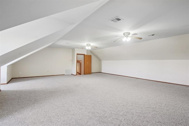 1227 Stout Dr NW, Piedmont, OK 73078 - bonus room featuring carpet, vaulted ceiling, baseboards, and ceiling fan