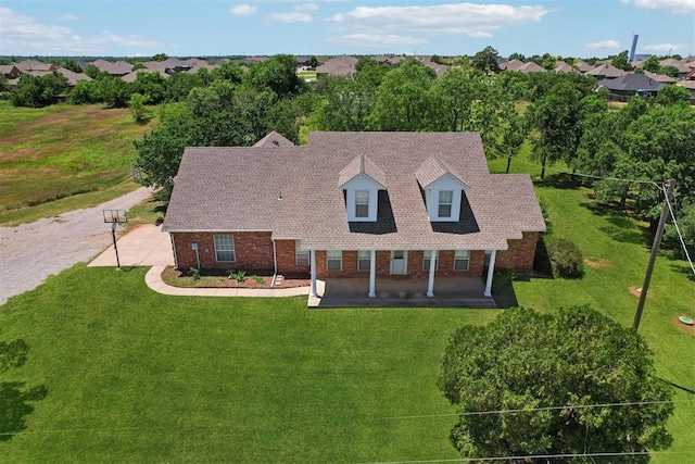 1227 Stout Dr NW, Piedmont, OK 73078 - view of front of property with brick siding and a front yard