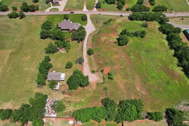 1227 Stout Dr NW, Piedmont, OK 73078 - aerial overview of property's location with rural landscape