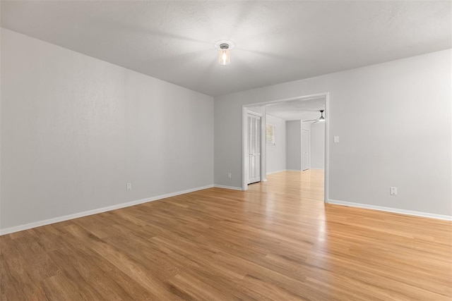 6 Utah Ave, Yukon, OK 73099 - spare room with light wood-style flooring and baseboards