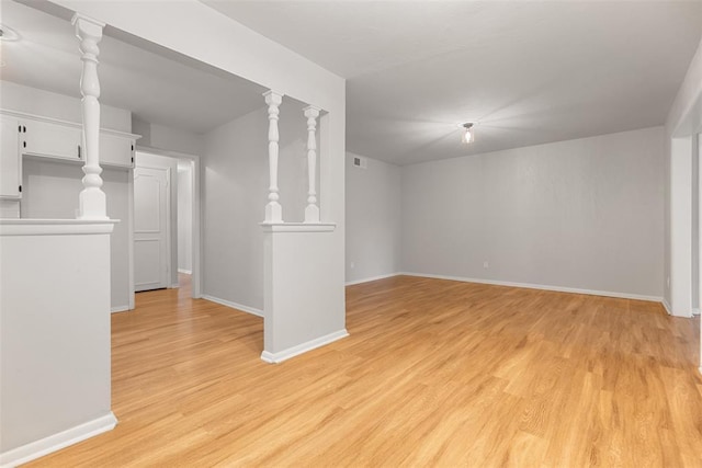 6 Utah Ave, Yukon, OK 73099 - below grade area featuring light wood-type flooring and baseboards