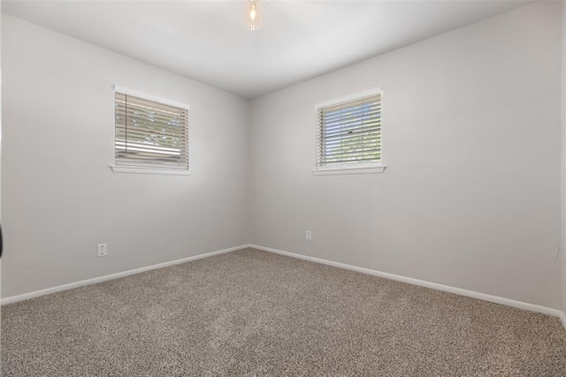 6 Utah Ave, Yukon, OK 73099 - spare room featuring healthy amount of natural light, carpet, and baseboards