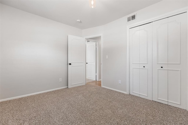6 Utah Ave, Yukon, OK 73099 - unfurnished bedroom with carpet floors, baseboards, and a closet