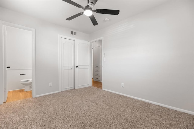 6 Utah Ave, Yukon, OK 73099 - unfurnished bedroom featuring light carpet, baseboards, a closet, and ensuite bath
