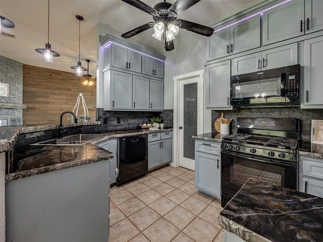 1900 New Haven Ct, Moore, OK 73160 - kitchen with black appliances, a sink, ceiling fan, backsplash, and light tile patterned floors