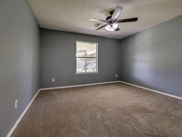 1900 New Haven Ct, Moore, OK 73160 - carpeted spare room with a textured ceiling, a ceiling fan, baseboards, and a textured wall