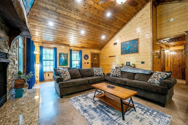 295 Orca Rd, Broken Bow, OK 74728 - living room featuring finished concrete flooring, wooden ceiling, wooden walls, high vaulted ceiling, and ceiling fan
