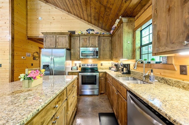 295 Orca Rd, Broken Bow, OK 74728 - kitchen featuring stainless steel appliances, wooden walls, wooden ceiling, vaulted ceiling, and light stone counters