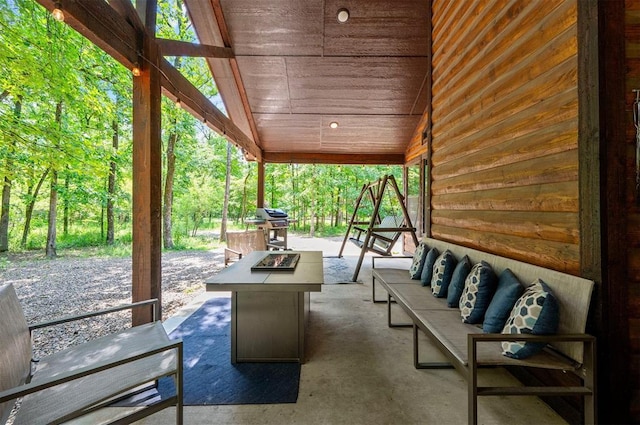 295 Orca Rd, Broken Bow, OK 74728 - view of patio / terrace featuring a fire pit