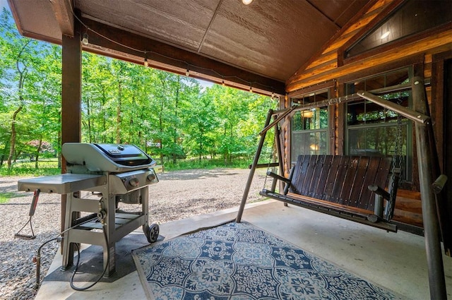 295 Orca Rd, Broken Bow, OK 74728 - view of patio / terrace featuring a grill and view of wooded area