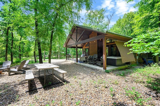 295 Orca Rd, Broken Bow, OK 74728 - surrounding community featuring a patio area