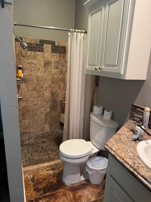 17308 Magnino Rd, Shawnee, OK 74801 - full bathroom featuring toilet, a stall shower, and vanity
