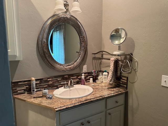 17308 Magnino Rd, Shawnee, OK 74801 - bathroom with decorative backsplash and vanity