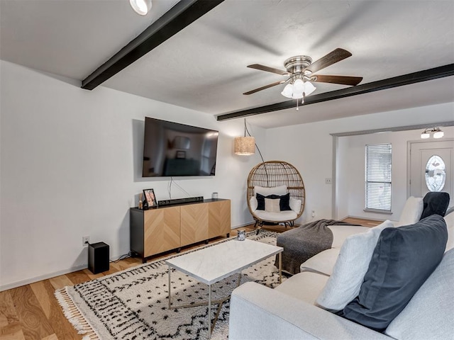 209 E Platt Dr, Yukon, OK 73099 - living room with beam ceiling, ceiling fan, light wood-style floors, and baseboards