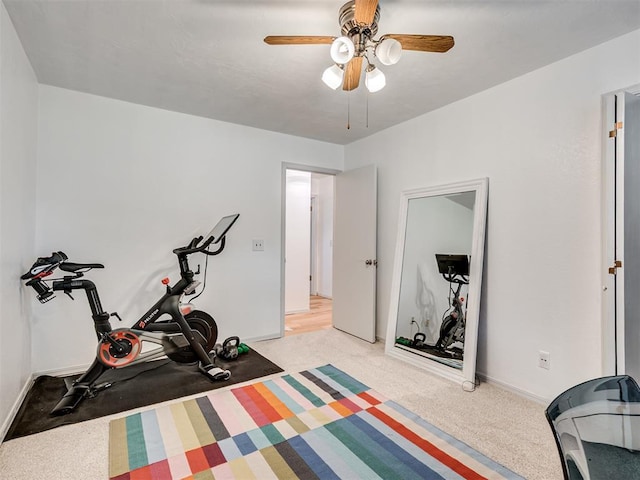 209 E Platt Dr, Yukon, OK 73099 - exercise room with ceiling fan, light colored carpet, and baseboards