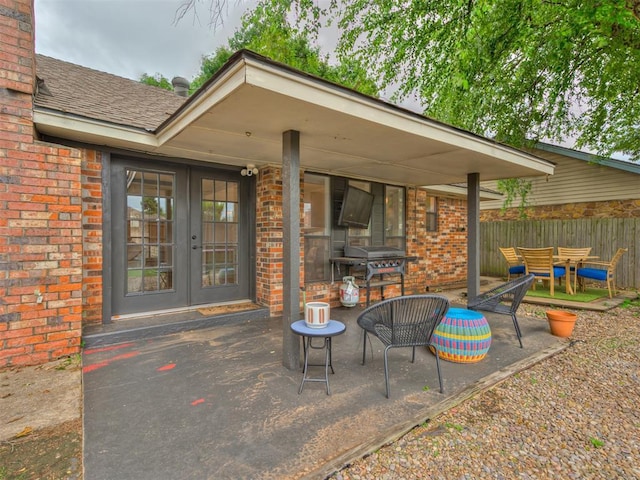 209 E Platt Dr, Yukon, OK 73099 - view of patio / terrace with french doors and grilling area