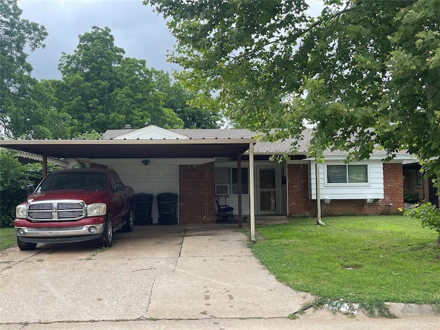 617 Mark Dr, Oklahoma City, OK 73115 - single story home featuring a front yard, an attached garage, driveway, and brick siding