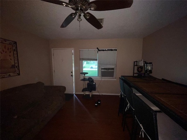 617 Mark Dr, Oklahoma City, OK 73115 - living area with cooling unit, ceiling fan, and baseboards