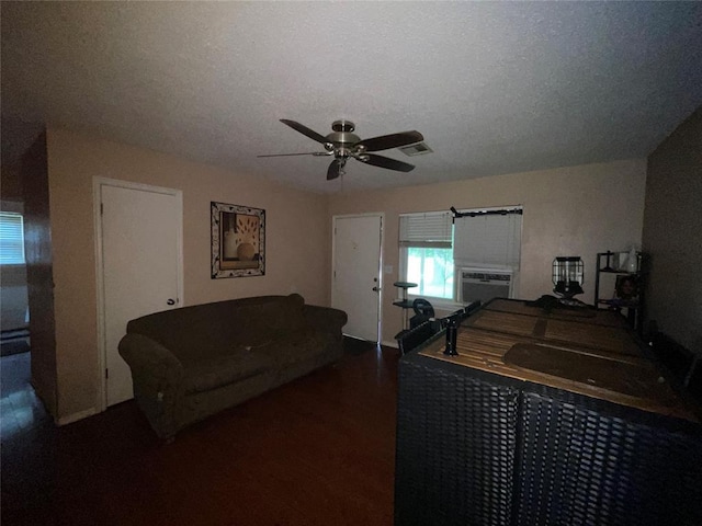 617 Mark Dr, Oklahoma City, OK 73115 - living area with ceiling fan and cooling unit