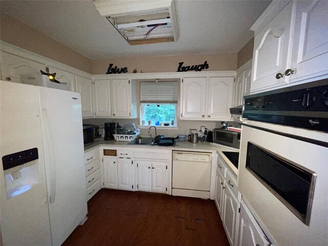 617 Mark Dr, Oklahoma City, OK 73115 - kitchen with white appliances, a sink, white cabinetry, and light countertops