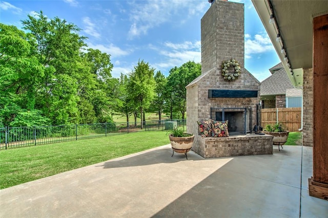 600 NW 186th St, Edmond, OK 73012 - view of patio with an outdoor brick fireplace