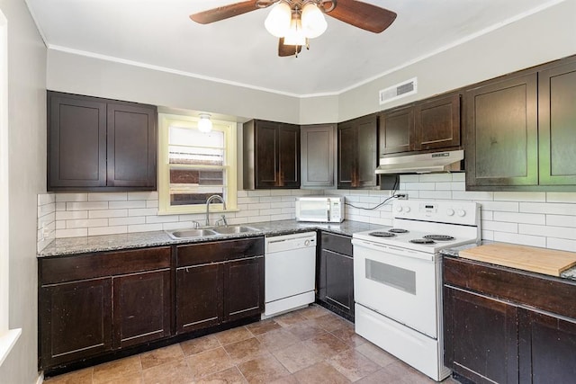 3032 NW 67th St, Oklahoma City, OK 73116 - kitchen featuring white appliances, under cabinet range hood, a sink, tasteful backsplash, and ornamental molding