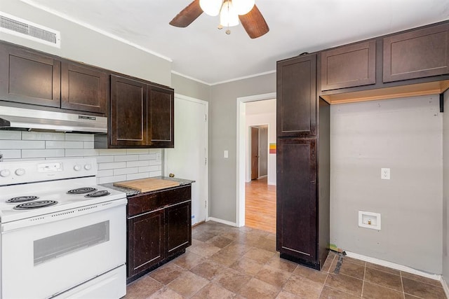 3032 NW 67th St, Oklahoma City, OK 73116 - kitchen featuring electric stove, under cabinet range hood, ceiling fan, dark brown cabinetry, and crown molding