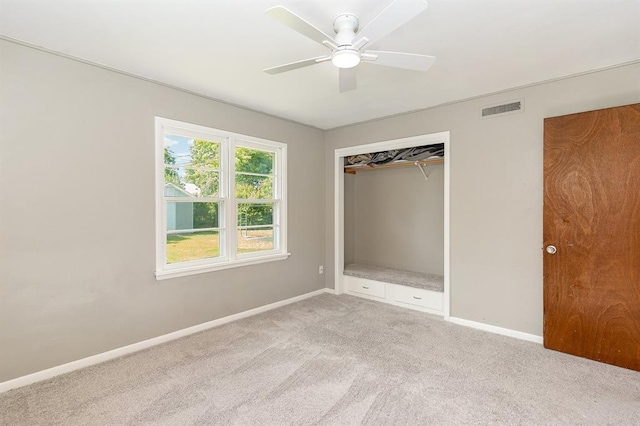 3032 NW 67th St, Oklahoma City, OK 73116 - unfurnished bedroom with light carpet, baseboards, and a ceiling fan
