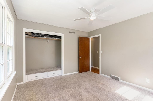 3032 NW 67th St, Oklahoma City, OK 73116 - unfurnished bedroom featuring light colored carpet, a closet, baseboards, and a ceiling fan