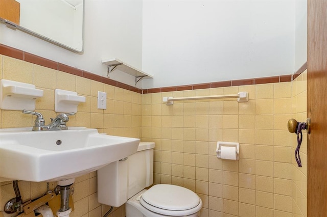3032 NW 67th St, Oklahoma City, OK 73116 - bathroom with tile walls and toilet