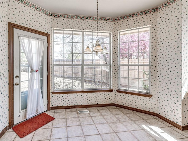 2616 Redvine Rd, Edmond, OK 73034 - unfurnished dining area with wallpapered walls and baseboards