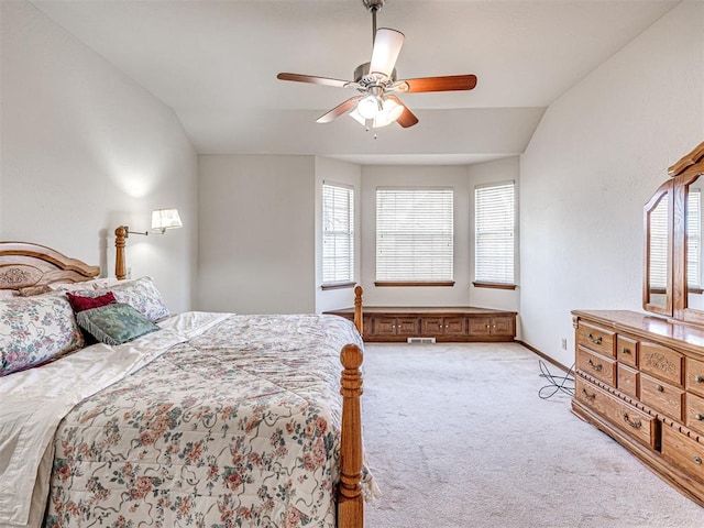 2616 Redvine Rd, Edmond, OK 73034 - carpeted bedroom with multiple windows, a ceiling fan, and baseboards