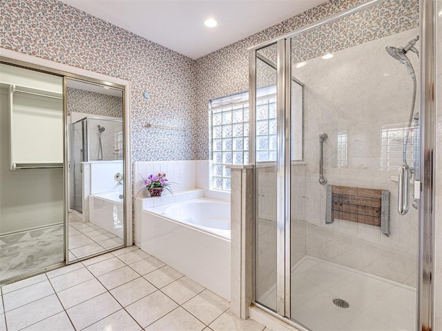 2616 Redvine Rd, Edmond, OK 73034 - full bath featuring a garden tub, wallpapered walls, a stall shower, tile patterned flooring, and recessed lighting