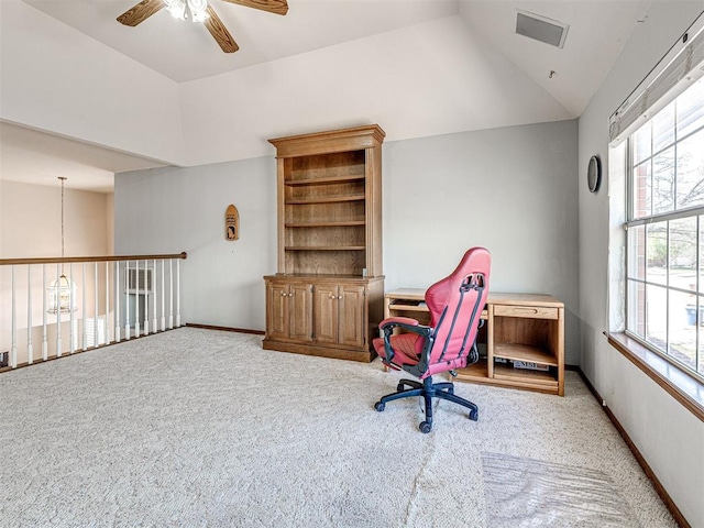 2616 Redvine Rd, Edmond, OK 73034 - home office featuring carpet flooring, vaulted ceiling, a ceiling fan, and baseboards
