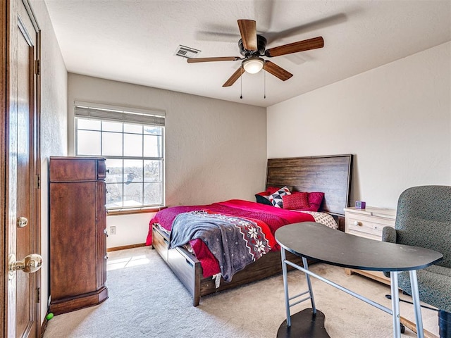 2616 Redvine Rd, Edmond, OK 73034 - carpeted bedroom with a ceiling fan and baseboards