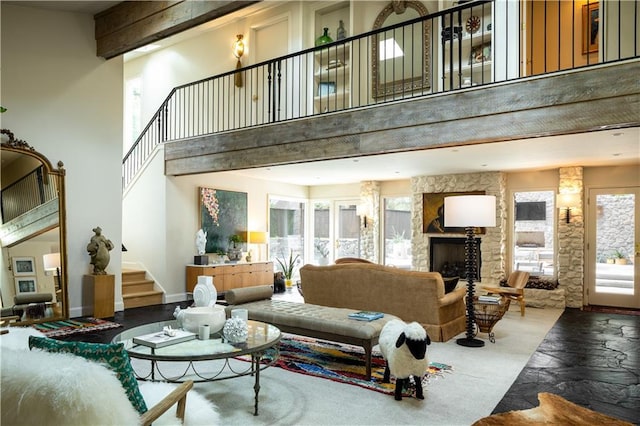 1917 Whispering Pines Cir, Norman, OK 73072 - living room featuring stairway, plenty of natural light, and a towering ceiling