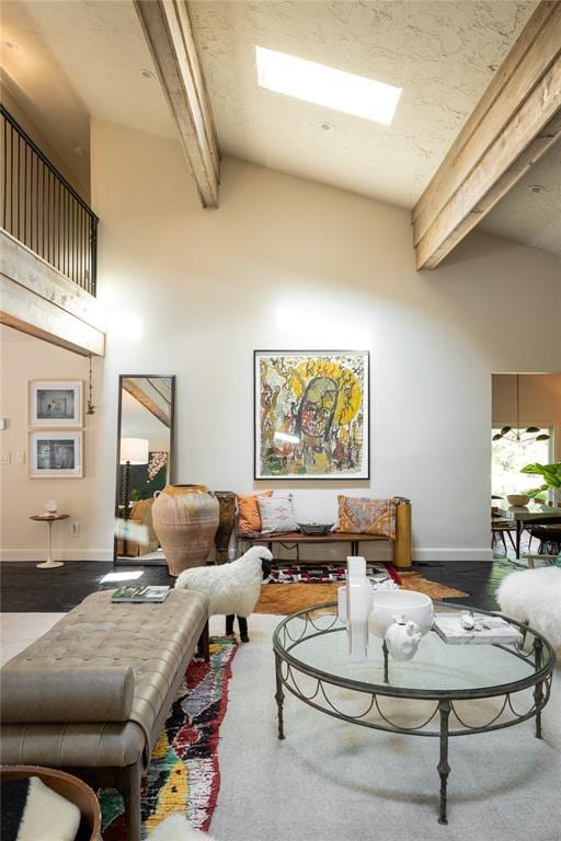 1917 Whispering Pines Cir, Norman, OK 73072 - living area featuring beam ceiling, baseboards, high vaulted ceiling, and wood finished floors