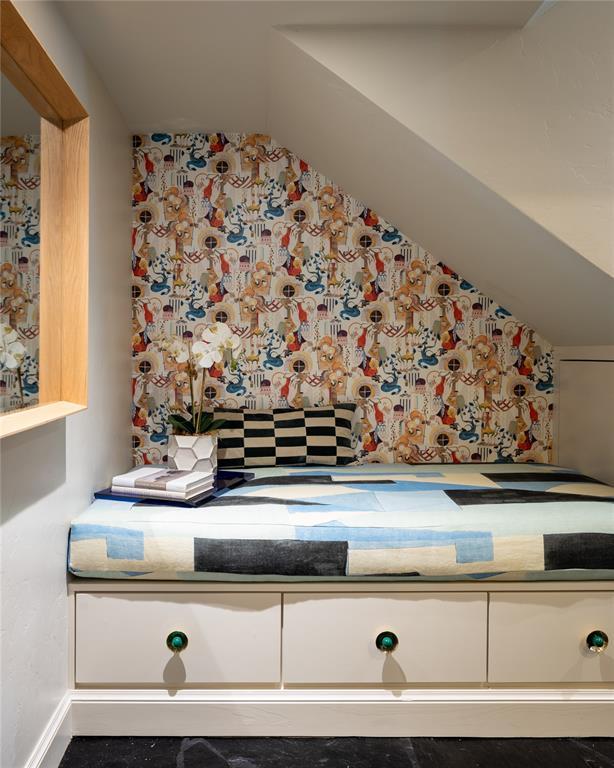 1917 Whispering Pines Cir, Norman, OK 73072 - unfurnished bedroom featuring lofted ceiling and baseboards