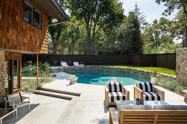 1917 Whispering Pines Cir, Norman, OK 73072 - view of pool with a fenced backyard, a patio, and outdoor lounge area