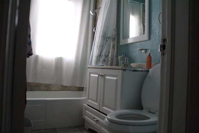 2508 N Cummings Dr, Oklahoma City, OK 73107 - bathroom with toilet, vanity, tile patterned floors, and shower / bath combo