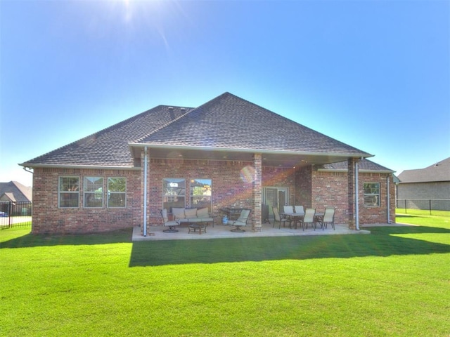 10716 Quail Reserve Rd, Oklahoma City, OK 73173 - rear view of property with brick siding, a patio area, and roof with shingles
