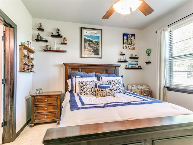 10716 Quail Reserve Rd, Oklahoma City, OK 73173 - bedroom featuring light colored carpet, a ceiling fan, and baseboards
