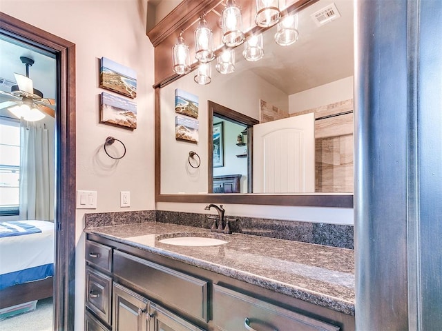 10716 Quail Reserve Rd, Oklahoma City, OK 73173 - ensuite bathroom featuring a ceiling fan and vanity