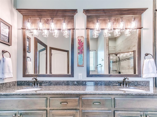 10716 Quail Reserve Rd, Oklahoma City, OK 73173 - bathroom with a shower stall, double vanity, and a chandelier