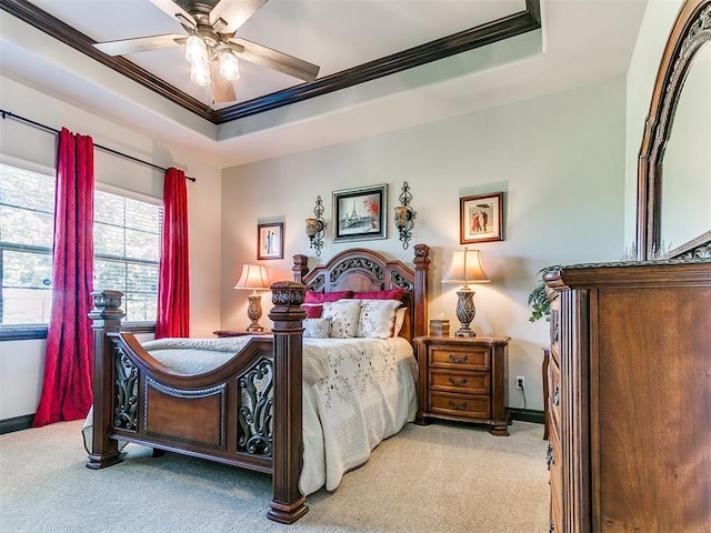 10716 Quail Reserve Rd, Oklahoma City, OK 73173 - bedroom with ornamental molding, carpet floors, a ceiling fan, baseboards, and a raised ceiling