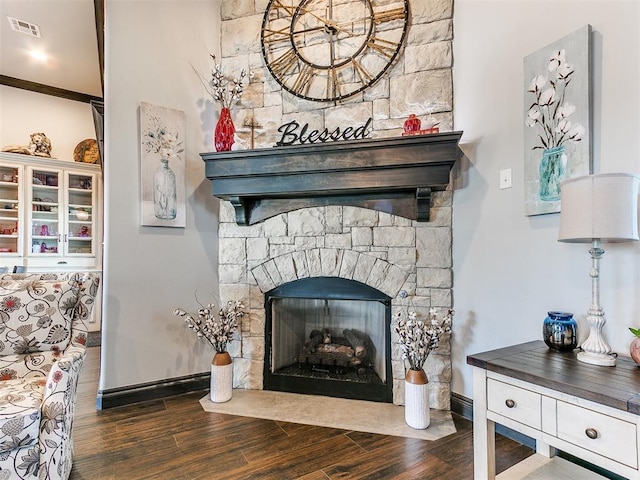 10716 Quail Reserve Rd, Oklahoma City, OK 73173 - detailed view of wood finished floors, a fireplace, and baseboards