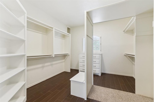 18617 Wolf Creek Dr, Edmond, OK 73012 - walk in closet featuring dark wood finished floors