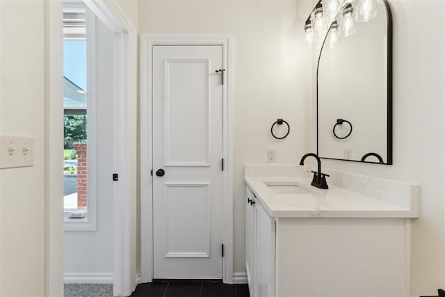 18617 Wolf Creek Dr, Edmond, OK 73012 - bathroom with vanity and baseboards